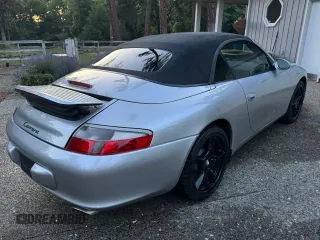 2004 Porsche 911 Carrera z VIN WP0CA299X4S651377, wystawiony jako Copart lot #60941235 z przebiegiem 139 410 mil mil oraz Szkoda całkowita • Salvage title. Historia ofert i sprzedaży dostępna na DreamBid. Obrazek 4.