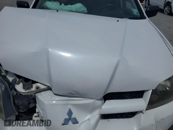 2004 Mitsubishi Outlander LS z VIN JA4LX31F44U047876, wystawiony jako Copart lot #59395585 z przebiegiem 148 726 mil mil oraz Szkoda całkowita • Salvage title. Historia ofert i sprzedaży dostępna na DreamBid. Obrazek 12.