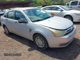 2008 Ford Focus SE with VIN 1FAHP35N98W293738, listed as a IAAI auction lot 41940524 with 147,351 mi miles. Bid and sale history available at carsss.com. Image 1.