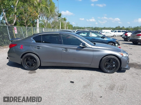 2014 Infiniti Q50 Sport with VIN JN1BV7AP4EM670443, listed as a IAAI auction lot 41801219 with 98,719 mi miles and . Bid and sale history available at DreamBid. Image 13.