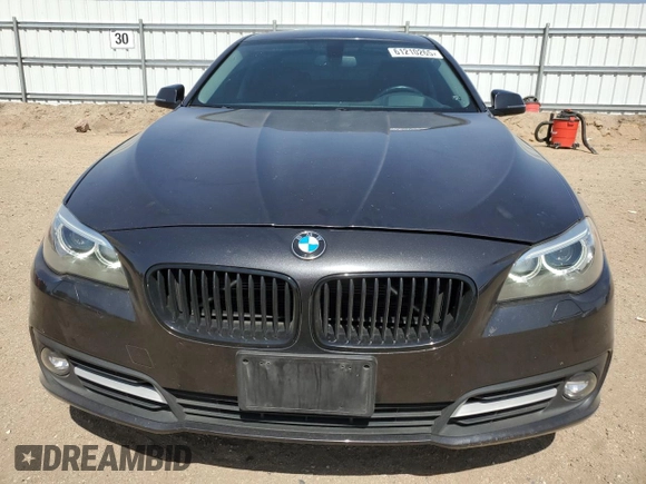 2016 BMW 5 Series 528i with VIN WBA5A5C51GG351554, listed as a Copart auction lot 61210265 with 73,968 mi miles and Salvage title. Bid and sale history available at DreamBid. Image 5.