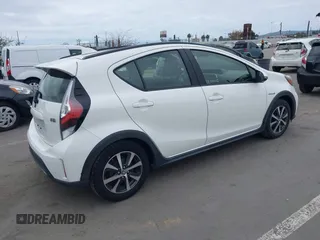 2018 Toyota Prius One with VIN JTDKDTB37J1615520, listed as a IAAI auction lot 42054113 with 76,989 mi miles and . Bid and sale history available at DreamBid. Image 4.