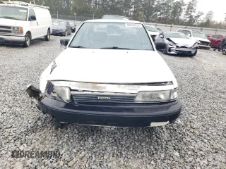 1988 Toyota Camry z VIN JT2SV21E7J3277138, wystawiony jako Copart lot #80039334 z przebiegiem 152 555 mil mil oraz Szkoda całkowita • Salvage title. Historia ofert i sprzedaży dostępna na DreamBid. Obrazek 5.