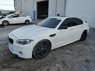 2016 BMW M5 with VIN WBSFV9C56GD595472, listed as a Copart auction lot 78139613 with 52,135 mi miles. Bid and sale history available at carsss.com. Image 1.