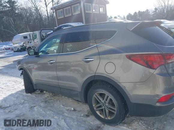 2017 Hyundai Santa Fe 2.4L with VIN 5NMZUDLB4HH034437, listed as a IAAI auction lot 41565545 with 96,640 mi miles and . Bid and sale history available at DreamBid. Image 14.