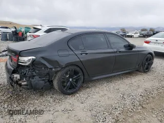 2018 BMW 7 Series 750i with VIN WBA7F0C55JGM23537, listed as a Copart auction lot 76824074 with 64,682 mi miles and Salvage Title. Bid and sale history available at carsss.com. Image 3.