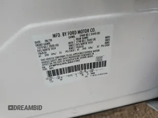2020 Ford Edge SEL z VIN 2FMPK4J95LBB21392, wystawiony jako Copart lot #60912275 z przebiegiem 82 527 mil mil oraz Szkoda całkowita • Salvage title. Historia ofert i sprzedaży dostępna na DreamBid. Obrazek 13.