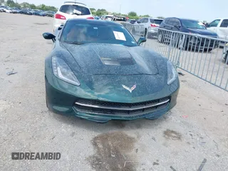 2014 Chevrolet Corvette Z51 2LT z VIN 1G1YK2D75E5104938, wystawiony jako IAAI lot #42168651 z przebiegiem 152 471 mil mil oraz . Historia ofert i sprzedaży dostępna na DreamBid. Obrazek 12.