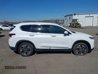2019 Hyundai Santa Fe Ultimate with VIN 5NMS5CAA0KH067753, listed as a IAAI auction lot 41884396 with 31,343 mi miles and . Bid and sale history available at DreamBid. Image 13.