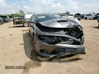 2021 Dodge Charger R/T with VIN 2C3CDXCT7MH613111, listed as a Copart auction lot 56367725 with 77,374 mi miles and Salvage title. Bid and sale history available at DreamBid. Image 14.