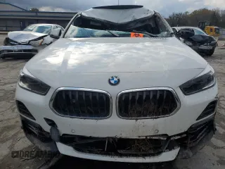 2022 BMW X2 sDrive28i with VIN WBXYH9C0XN5U53700, listed as a Copart auction lot 80884664 with 0 mi miles and Salvage Title. Bid and sale history available at carsss.com. Image 5.