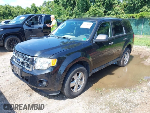 2011 Ford Escape XLS with VIN 1FMCU0C71BKA85329, listed as a IAAI auction lot 42774590 with 226,820 mi miles and . Bid and sale history available at DreamBid. Image 2.