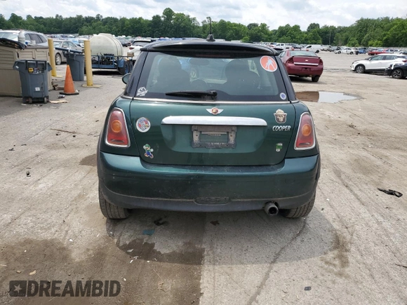 2007 MINI Hardtop with VIN WMWMF33537TL77985, listed as a Copart auction lot 61908635 with 180,470 mi miles and Salvage title. Bid and sale history available at DreamBid. Image 6.