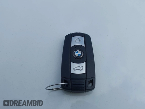 2008 BMW 3 Series 328i with VIN WBAVC53518F008938, listed as a IAAI auction lot 42150683 with 129,989 mi miles. Bid and sale history available at carsss.com. Image 11.