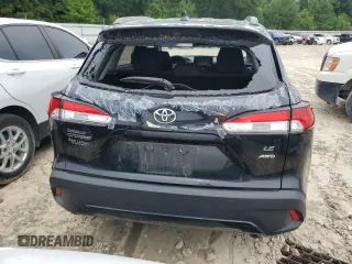 2022 Toyota Corolla Cross LE with VIN 7MUCAABG3NV021235, listed as a Copart auction lot 60644285 with 82,403 mi miles and Clean title. Bid and sale history available at DreamBid. Image 6.