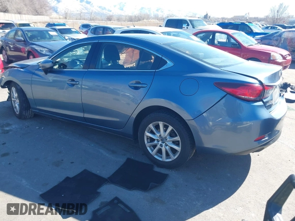 2016 Mazda 6 i Sport with VIN JM1GJ1U57G1451597, listed as a IAAI auction lot 41658184 with 142,504 mi miles and . Bid and sale history available at DreamBid. Image 3.