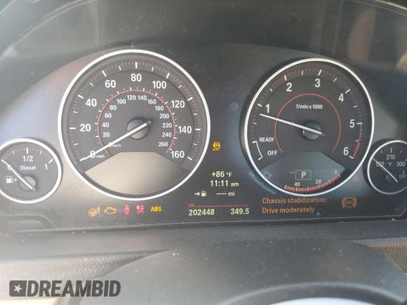 2014 BMW 3 Series 328d xDrive with VIN WBA3K5C56EKT33677, listed as a Copart auction lot 70003954 with 202,448 mi miles and Salvage title. Bid and sale history available at DreamBid. Image 9.