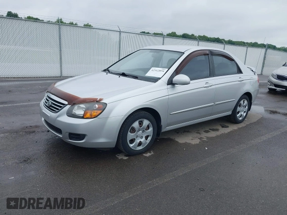 2009 Kia Spectra EX z VIN KNAFE221X95658662, wystawiony jako IAAI lot #42312854 z przebiegiem 100 489 mil mil oraz . Historia ofert i sprzedaży dostępna na DreamBid. Obrazek 2.