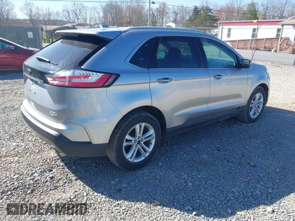 2020 Ford Edge SEL z VIN 2FMPK4J93LBB01318, wystawiony jako IAAI lot #42038334 z przebiegiem 73 435 mil mil oraz . Historia ofert i sprzedaży dostępna na DreamBid. Obrazek 4.