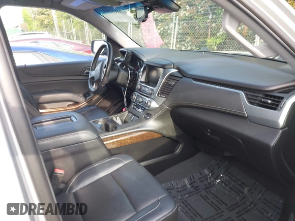 2019 Chevrolet Tahoe LT with VIN 1GNSCBKCXKR219413, listed as a IAAI auction lot 42013260 with 92,886 mi miles and . Bid and sale history available at DreamBid. Image 5.