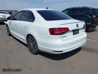2016 Volkswagen Jetta Sedan 1.8T Sport with VIN 3VWD17AJXGM394402, listed as a IAAI auction lot 41896331 with 147,771 mi miles. Bid and sale history available at carsss.com. Image 3.