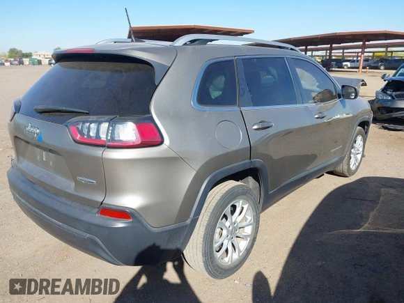 2019 Jeep Cherokee Latitude with VIN 1C4PJLCB2KD474165, listed as a IAAI auction lot 42100594 with 91,363 mi miles and . Bid and sale history available at DreamBid. Image 4.