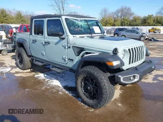 2023 Jeep Gladiator Willys z VIN 1C6HJTAGXPL539206, wystawiony jako IAAI lot #41523543 z przebiegiem 29 885 mil mil oraz . Historia ofert i sprzedaży dostępna na DreamBid. Obrazek 1.