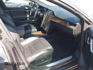 2019 Tesla Model S 75D with VIN 5YJSA1E25KF304371, listed as a IAAI auction lot 42349856 with 64,788 mi miles and . Bid and sale history available at DreamBid. Image 5.