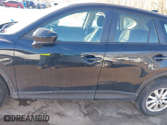 2014 Mazda CX-5 Sport with VIN JM3KE2BE7E0313978, listed as a IAAI auction lot 41437144 with 161,181 mi miles and . Bid and sale history available at carsss.com. Image 14.