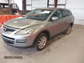 2009 Mazda CX-9 Touring z VIN JM3TB28A690180511, wystawiony jako IAAI lot #42247011 z przebiegiem 190 912 mil mil oraz . Historia ofert i sprzedaży dostępna na DreamBid. Obrazek 2.