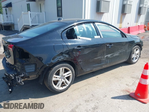 2015 Volvo S60 T5 Drive-E Premier with VIN YV140MFK6F1346875, listed as a IAAI auction lot 42004365 with 98,574 mi miles and . Bid and sale history available at DreamBid. Image 4.