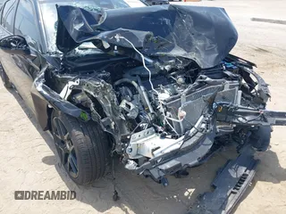 2025 Honda Civic Sport with VIN 2HGFE2F50SH503098, listed as a IAAI auction lot 42086699 with Not provided miles and . Bid and sale history available at DreamBid. Image 6.