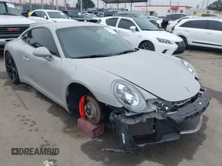 2018 Porsche 911 Carrera S z VIN WP0AB2A96JS122763, wystawiony jako IAAI lot #42170751 z przebiegiem 26 390 mil mil oraz . Historia ofert i sprzedaży dostępna na DreamBid. Obrazek 1.