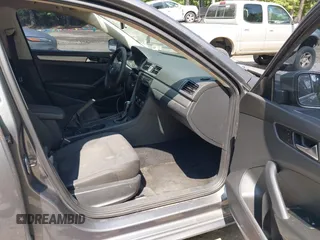 2014 Volkswagen Passat S with VIN 1VWAP7A37EC018693, listed as a IAAI auction lot 42463719 with 143,105 mi miles and . Bid and sale history available at DreamBid. Image 5.