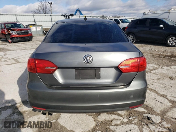 2012 Volkswagen Jetta Sedan SEL w/Sunroof with VIN 3VWLX7AJ0CM389522, listed as a Copart auction lot 86277254 with 0 mi miles and Salvage Title. Bid and sale history available at carsss.com. Image 6.