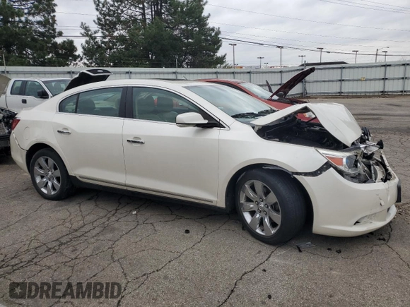 2013 Buick LaCrosse Premium 1 с VIN 1G4GG5E37DF213570, выставлен на аукционе Copart как лот 82154134 с пробегом 152 478 миль миль и Списание • Salvage title. История ставок и продаж доступна на DreamBid. Изображение 4.