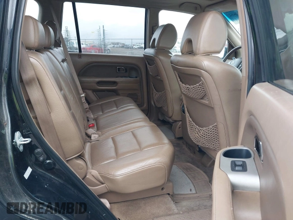 2006 Honda Pilot EX-L with VIN 2HKYF18726H552054, listed as a IAAI auction lot 41822652 with 153,822 mi miles and . Bid and sale history available at DreamBid. Image 8.