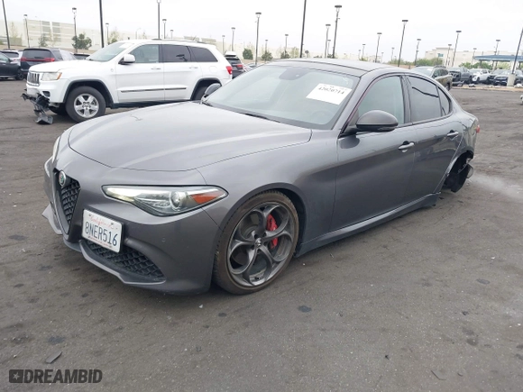2019 Alfa Romeo Giulia Ti with VIN ZARFAMBN6K7607298, listed as a IAAI auction lot 42020714 with 67,469 mi miles. Bid and sale history available at carsss.com. Image 2.