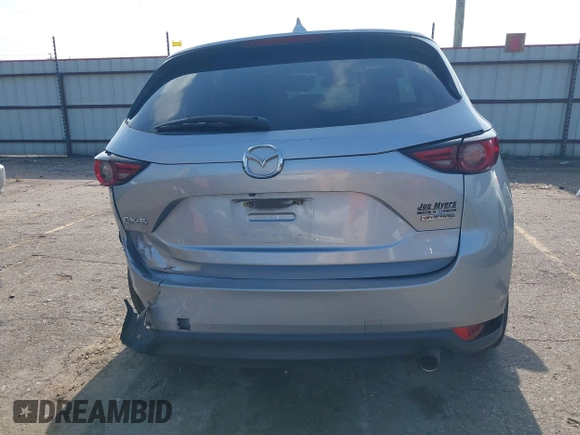 2020 Mazda CX-5 Grand Touring with VIN JM3KFADM5L0739306, listed as a IAAI auction lot 42215667 with 126,100 mi miles and . Bid and sale history available at DreamBid. Image 16.
