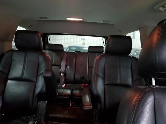 2014 GMC Yukon SLT with VIN 1GKS2CE01ER123696, listed as a Copart auction lot 63401554 with 177,174 mi miles and Salvage Title. Bid and sale history available at carsss.com. Image 10.