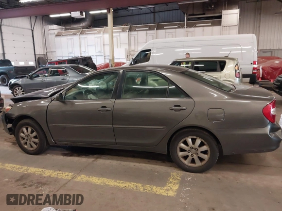 2003 Toyota Camry LE with VIN 4T1BE32K13U754348, listed as a IAAI auction lot 41765418 with 194,227 mi miles and . Bid and sale history available at DreamBid. Image 15.