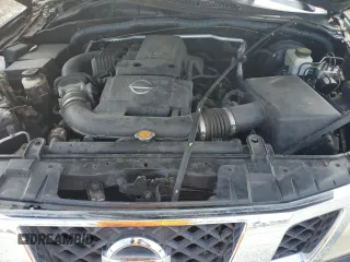 2010 Nissan Frontier Pro-4X with VIN 1N6AD0EV2AC401933, listed as a Copart auction lot 53980575 with 188,170 mi miles and Salvage title. Bid and sale history available at DreamBid. Image 11.