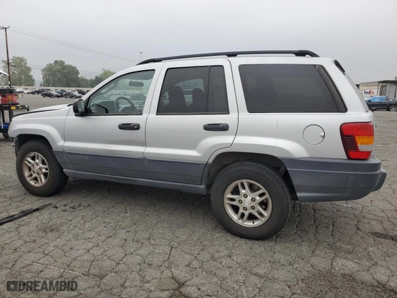 2004 Jeep Grand Cherokee Laredo with VIN 1J4GX48S64C151124, listed as a Copart auction lot 52669445 with 152,970 mi miles and Salvage Title. Bid and sale history available at carsss.com. Image 2.