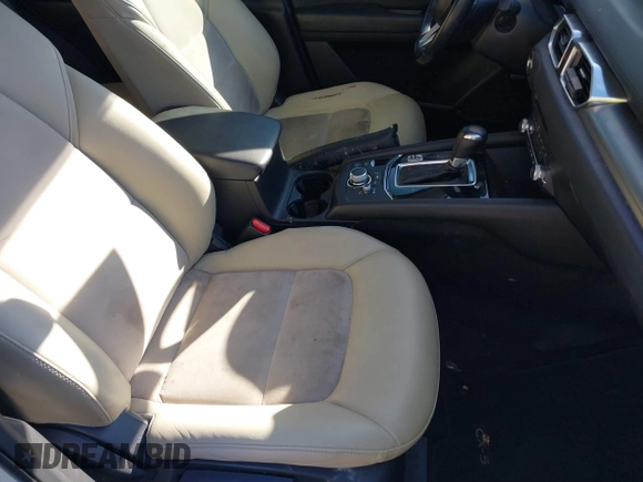2020 Mazda CX-5 Touring with VIN JM3KFACM6L0737727, listed as a IAAI auction lot 41283200 with 85,949 mi miles and . Bid and sale history available at carsss.com. Image 5.