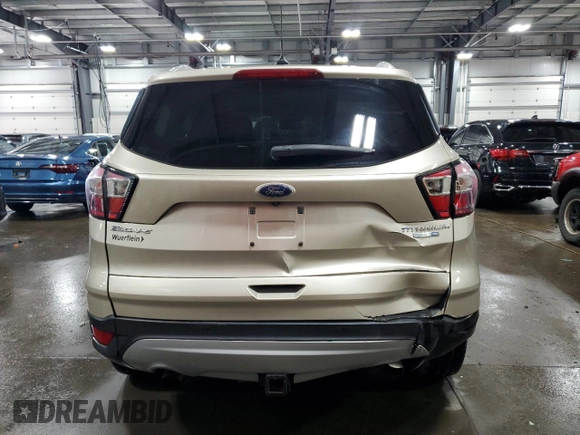 2018 Ford Escape Titanium с VIN 1FMCU9J93JUC08799, выставлен на аукционе Copart как лот 48961795 с пробегом 78 127 миль миль и Списание • Salvage title. История ставок и продаж доступна на DreamBid. Изображение 6.