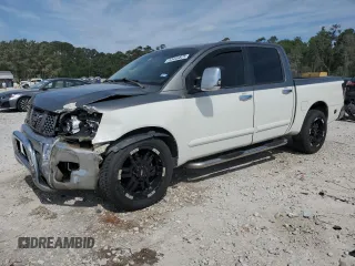 2004 Nissan Titan LE with VIN 1N6AA07A44N580326, listed as a Copart auction lot 53446825 with 236,618 mi miles and Salvage title. Bid and sale history available at DreamBid. Image 1.