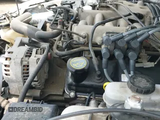 2002 Ford Mustang Standard z VIN 1FAFP40462F112288, wystawiony jako IAAI lot #42896142 z przebiegiem 109 982 mil mil oraz . Historia ofert i sprzedaży dostępna na DreamBid. Obrazek 19.