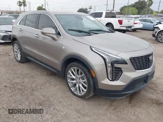 2023 Cadillac XT4 FWD Luxury z VIN 1GYAZAR43PF152992, wystawiony jako IAAI lot #42160015 z przebiegiem 29 466 mil mil oraz . Historia ofert i sprzedaży dostępna na DreamBid. Obrazek 1.