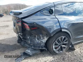 2023 Tesla Model X with VIN 7SAXCDE52PF425834, listed as a IAAI auction lot 41996298 with Not Provided miles and . Bid and sale history available at DreamBid. Image 6.