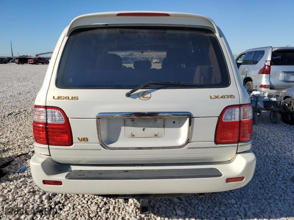 2000 Lexus LX 470 with VIN JT6HT00W7Y0114787, listed as a Copart auction lot 84433924 with 0 mi miles and Salvage Title. Bid and sale history available at carsss.com. Image 6.